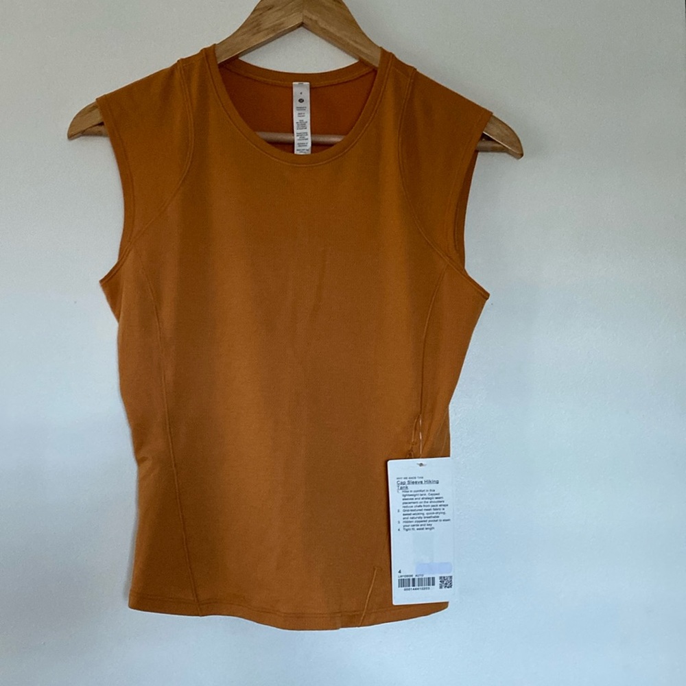 Burnt orange Lululemon tank top.